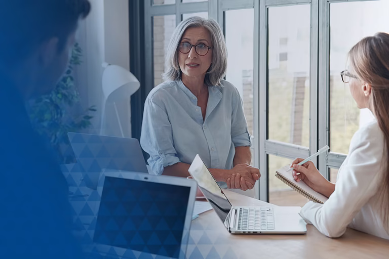 2 female QA specialists in meeting